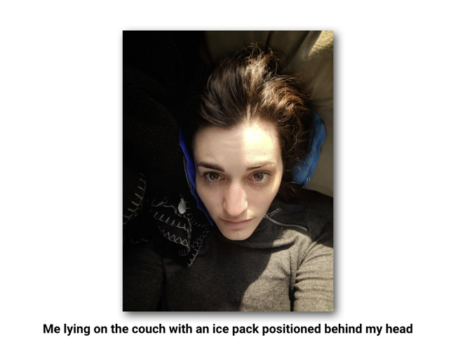 Photo of Julia laying on the couch with an ice pack behind her head